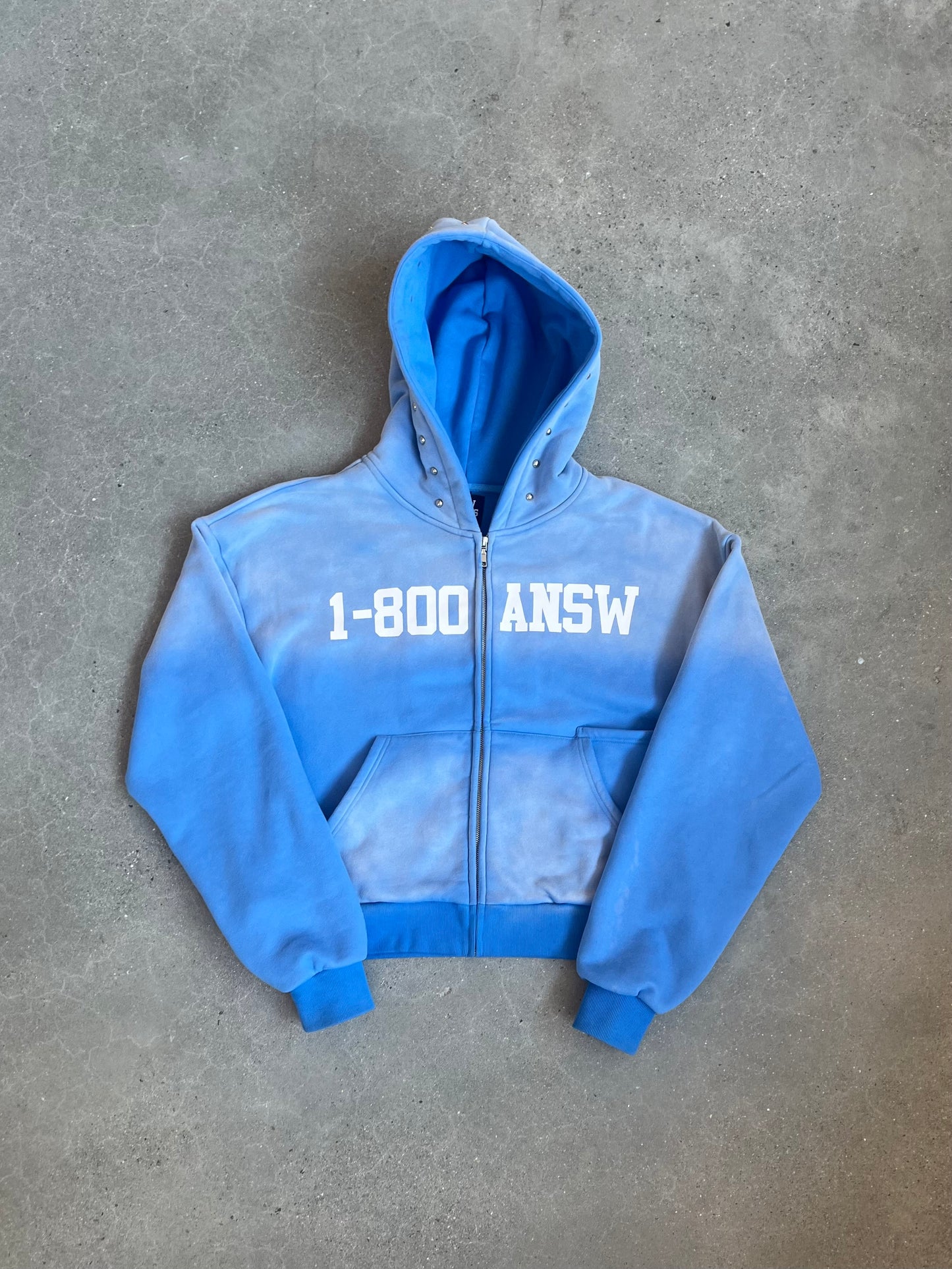 Baby blue “1-800 ANSW” zip up